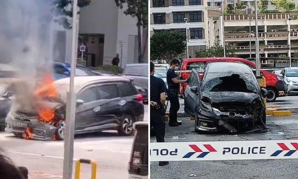 Burning car at the carpark next to the Old Airport Road Food Centre.