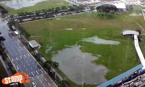 'Natural lakes' return after rain at Marina Bay, this time creeping closer to train station