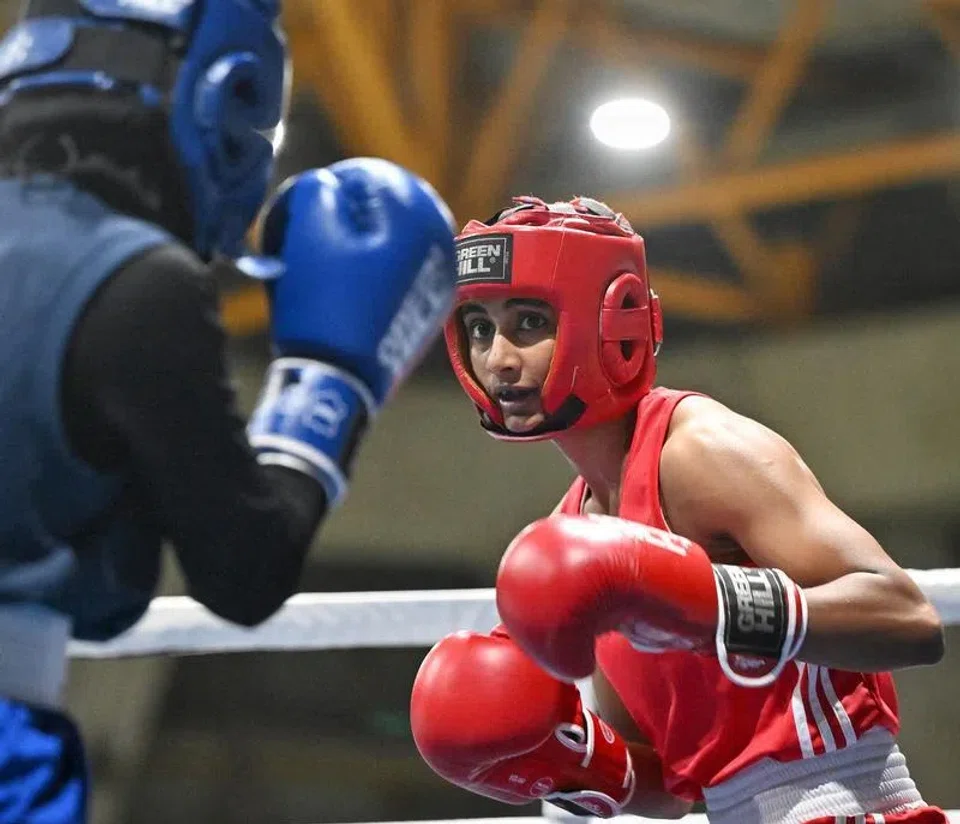 Danisha Mathialagan in the 48kg final at this year’s National Boxing Championships. (Left) Danisha working as an embalmer at Goh Soon Moh Undertaker in 2022.