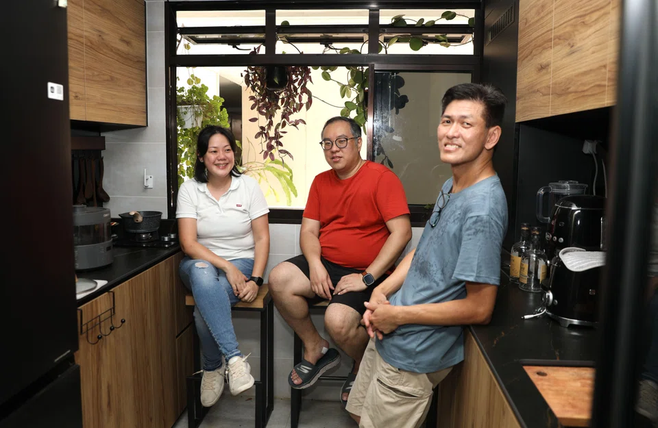 Mr Thomson Lim (right) and his Tengah buddies are among an estimated tens of thousands of Singaporeans who are members of resident-run Telegram groups for BTO estates here.