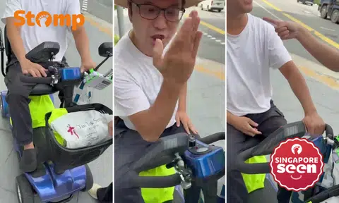 PMA user 'rams' into pedestrian, threatens to slap her: 'When you walk, don't see handphone!'