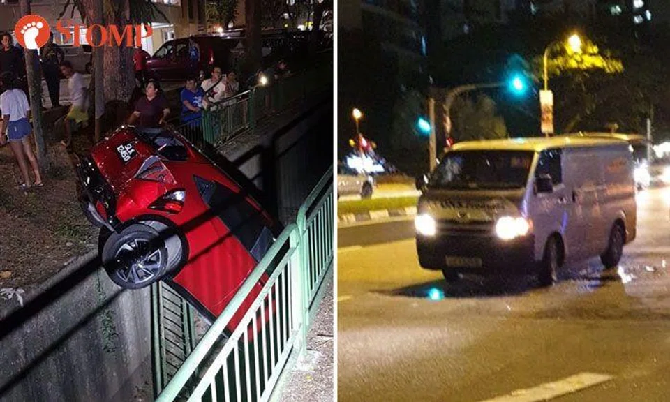 Car crashes into drain after collision with van at Yishun, 2 taken to hospital