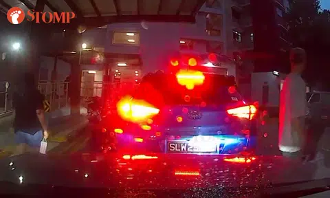Driver does not budge from sheltered pick-up point in Bukit Batok on rainy day