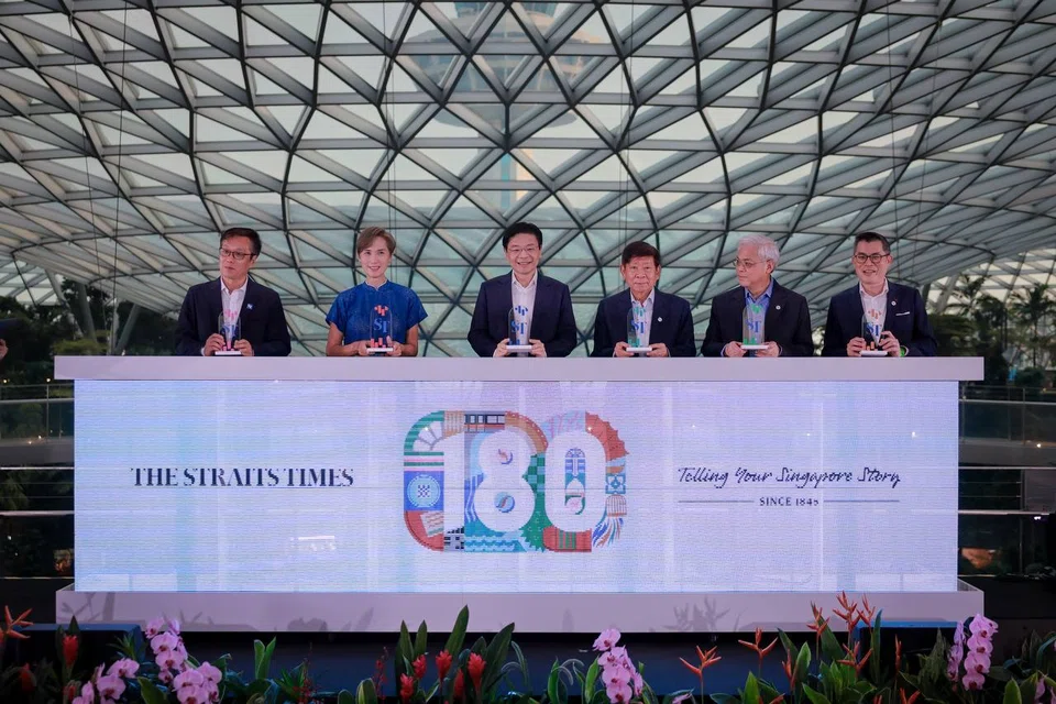 (From left) Editor-in-chief of SPH Media's English/Malay/Tamil Media group Wong Wei Kong, Minister for Digital Development and Information Josephine Teo, PM Lawrence Wong, SPH Media chairman Khaw Boon Wan, SPH Media CEO Chan Yeng Kit and ST editor Jaime Ho.