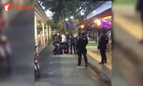 Man, allegedly high on drugs, tackled by police after wielding chopper at Eunos Crescent Market