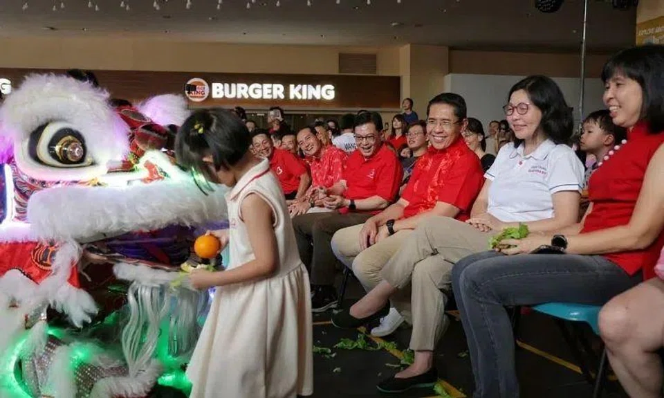 DPM Heng Swee Keat (centre) with East Coast GRC MPs (from right) Jessica Tan, Cheryl Chan, Maliki Osman and Tan Kiat How at the Chinese New Year carnival at Heartbeat@Bedok on Jan 25 