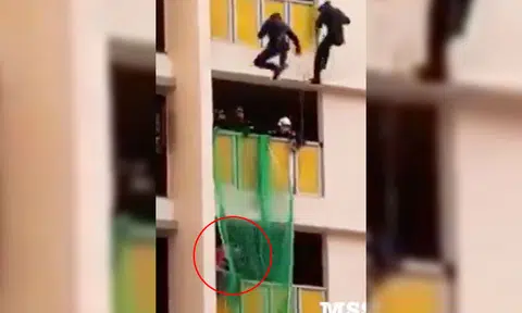 Video: SCDF officers rescue woman sitting on ledge at Redhill Close