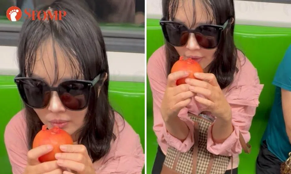 A woman was caught eating a whole tomato while onboard an MRT train on June 7. 