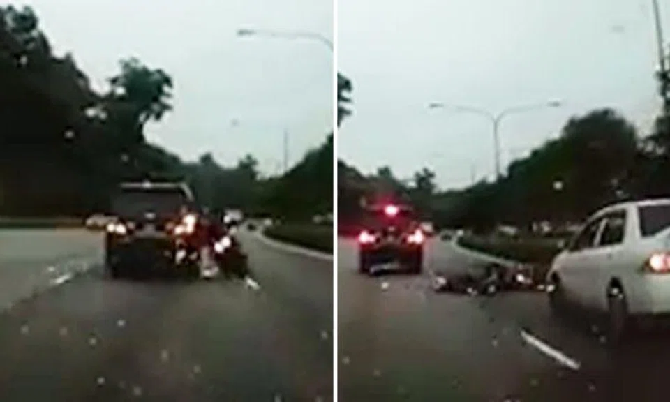 Biker knocked off motorcycle by idiot driver, then gets run over and dragged for 200m by another car