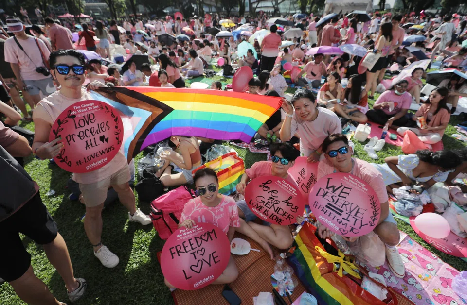 People in pink shirts calling for the repeal of Section 377A