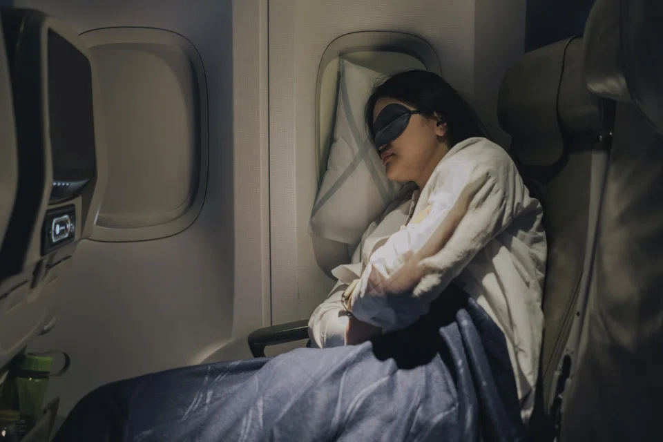 With some preparation before and during the flight, you may be able to get some quality sleep on a long-haul flight in economy class.