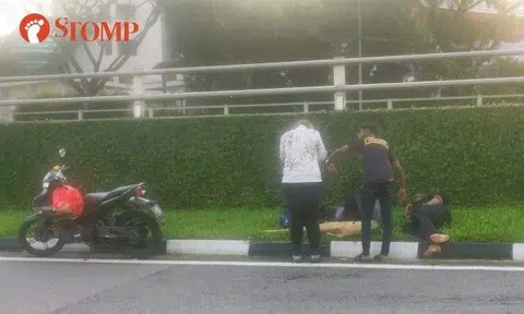 Stomper Johnny shared photos of the accident's aftermath, showing a man lying on the grass verge beside the road and passers-by who stopped to assist.