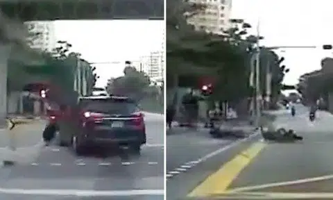 Rider sent skidding after driver makes illegal left turn at Punggol Drive