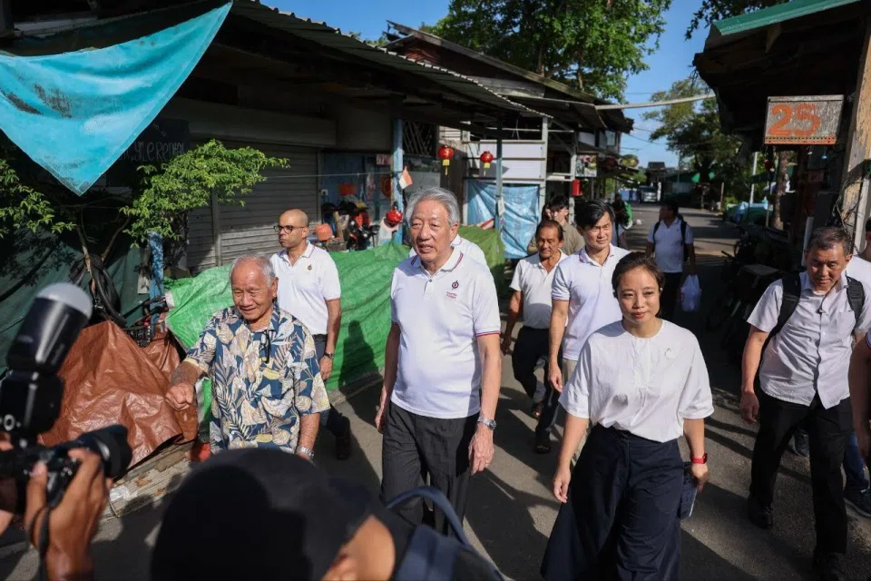 Senior Minister Teo Chee Hean (foreground, centre) leading a PAP team comprising party newcomer Valerie Lee, Senior Minister of State in the Prime Minister’s Office Desmond Tan (behind Ms Lee), Senior Minister of State (Digital Development and Information and Health) Janil Puthucheary and Pasir Ris-Punggol GRC MP Sharael Taha (behind SM Teo, partially hidden) during a visit to Pulau Ubin on April 11.