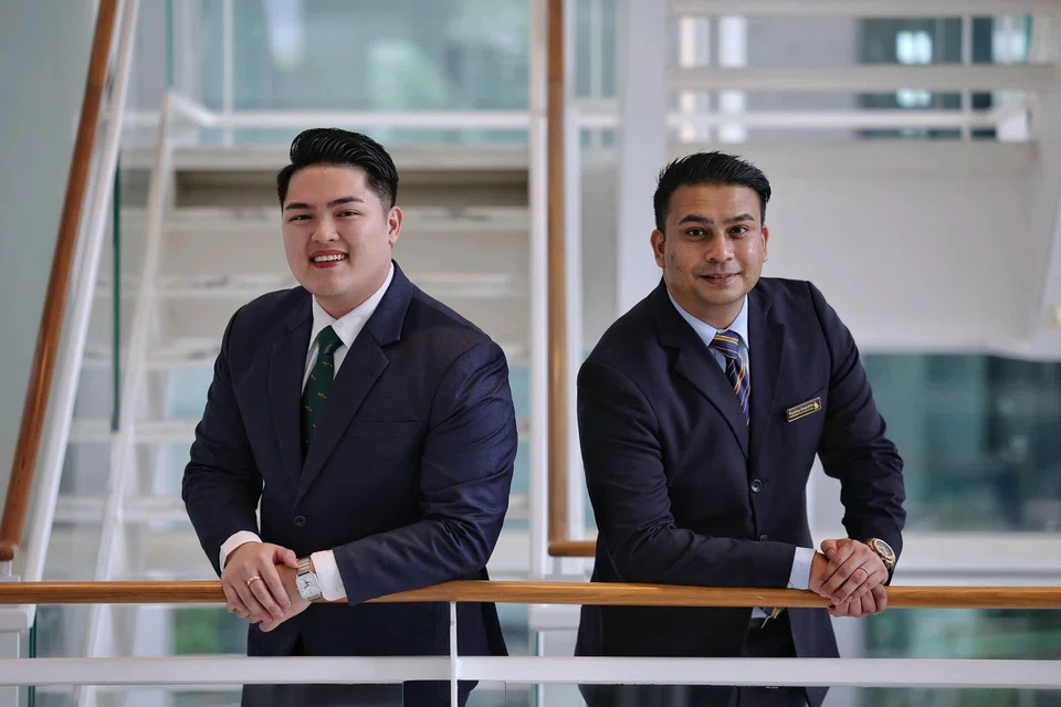 SIA premium services manager Bryan Lo (left) and passenger relations officer Shahfiee Sirajuddin assisted a wheelchair user who had an upset stomach and soiled his clothes after disembarking from his flight at Changi Airport in February. ST PHOTO: KEVIN LIM