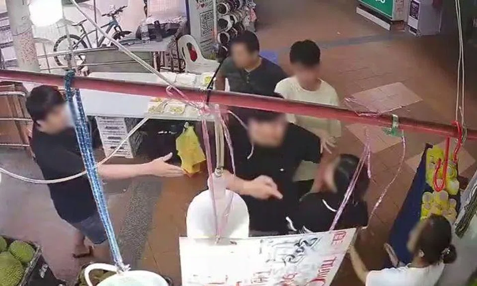 Man allegedly slaps durian seller and threatens to hit woman, 4 arrested