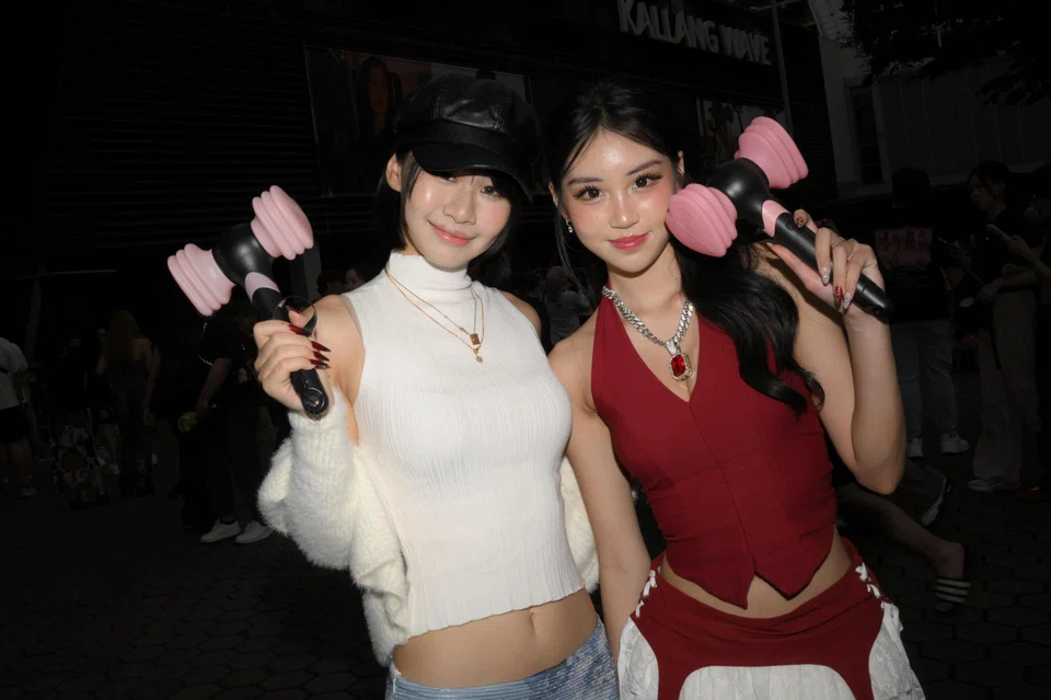 Rurusama (left) a Singaporean content creator, and Janice Yoong, a Malaysian influencer, pictured ahead of the Blackpink concert at the Singapore Sports Hub on Nov 28. ST PHOTO: MARK CHEONG