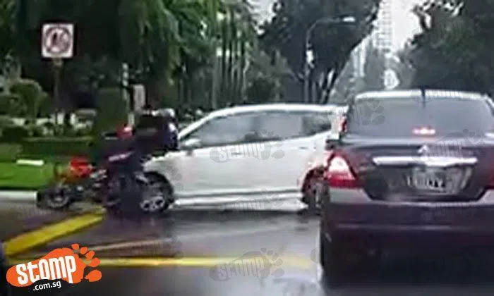 Driver turns right into oncoming traffic and knocks rider off his bike ...