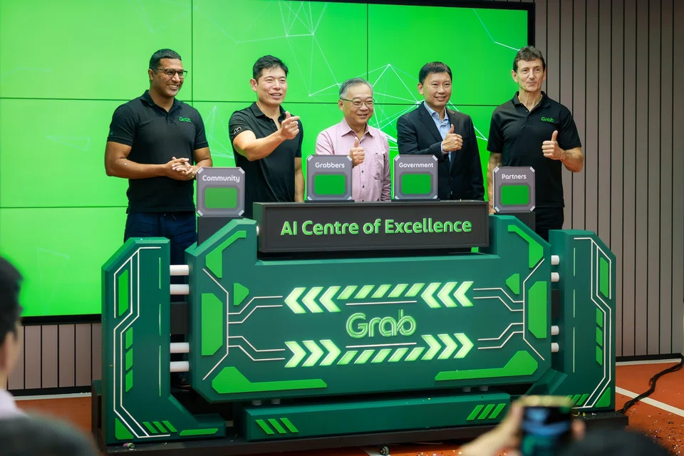 (From left) Grab chief technology officer Suthen Thomas, Grab chief executive Anthony Tan, DPM Gan Kim Yong, Transport Minister Chee Hong Tat and Grab chief operating officer Alex Hungate at the launch of Grab’s AI centre of excellence.