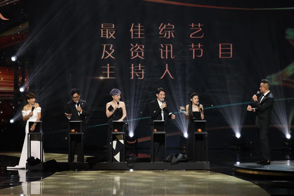 Chen Hanwei (far right) hosting the Star Awards in 2022, seen here with the nominees of the Best Programme Host (Entertainment & Infotainment) category (from right) Ke Le, Desmond Ng, Quan Yifeng, Guo Liang and Kym Ng.