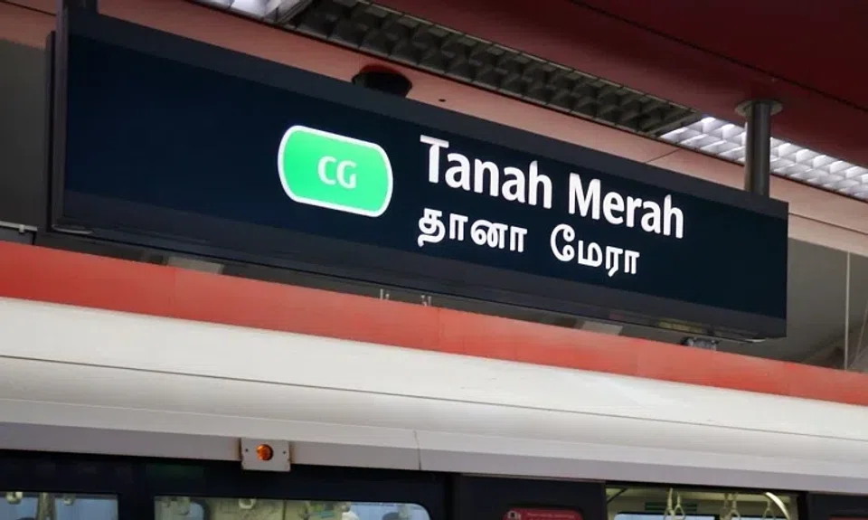 The latest video shows a man in a red T-shirt and black trousers standing at a corner near a platform screen door. 