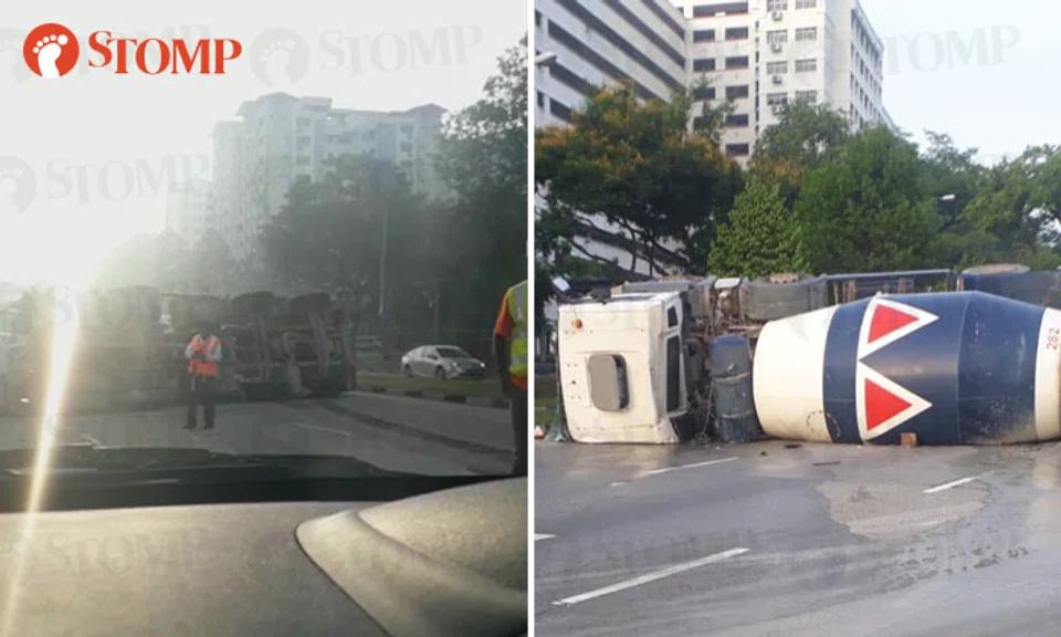 Driver, 34, taken to hospital after cement mixer truck overturns along ...