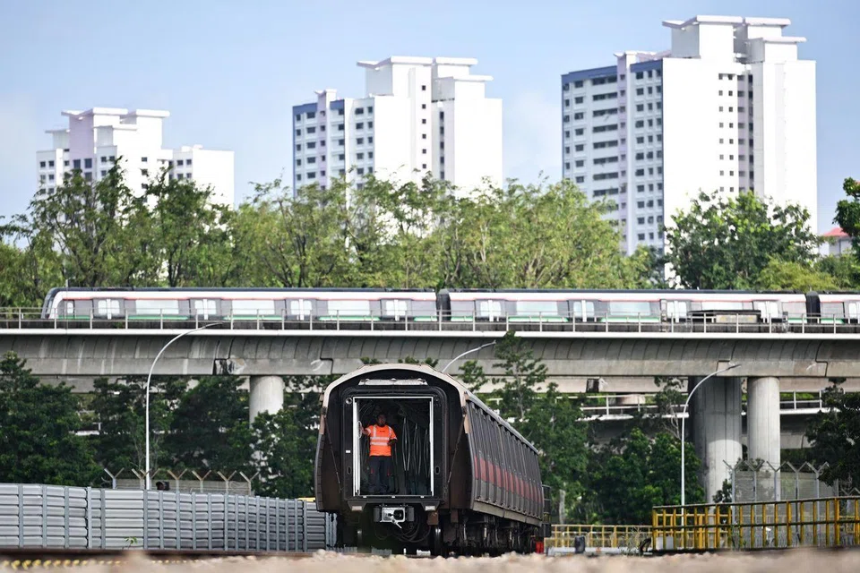 A train being shunted into Bishan Depot early on March 11, 2025, by a locomotive. To fit into the workshop, the six-carriage trains are shunted in three carriages at a time.