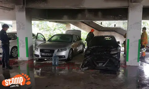 Poor Audi so suay -- gets damaged after Volkswagen catches fire at Block 310B Punggol Waterway carpark