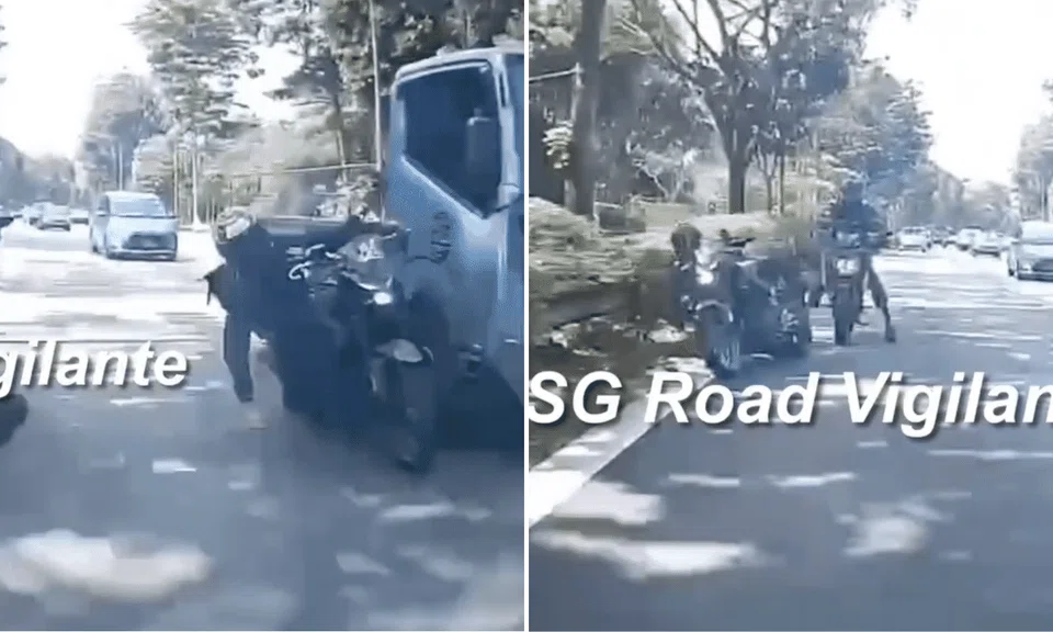 A motorcyclist slammed into a railing after losing control of his bike trying to weave between two vehicles.