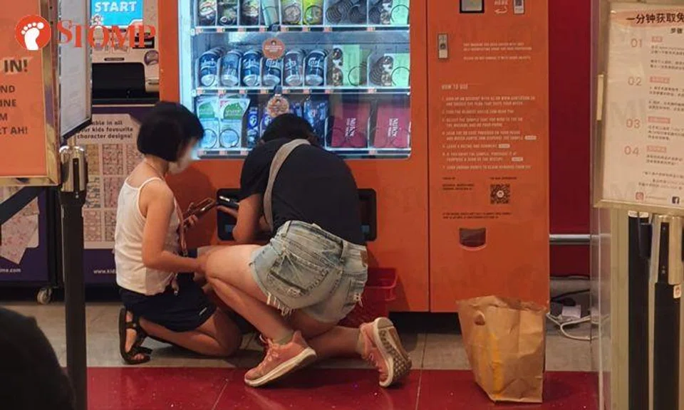 Shopper irked to see woman filling basket with samples from vending machine at AMK Hub