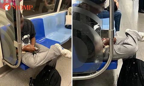 Commuters steer clear of man sitting in his own vomit on train