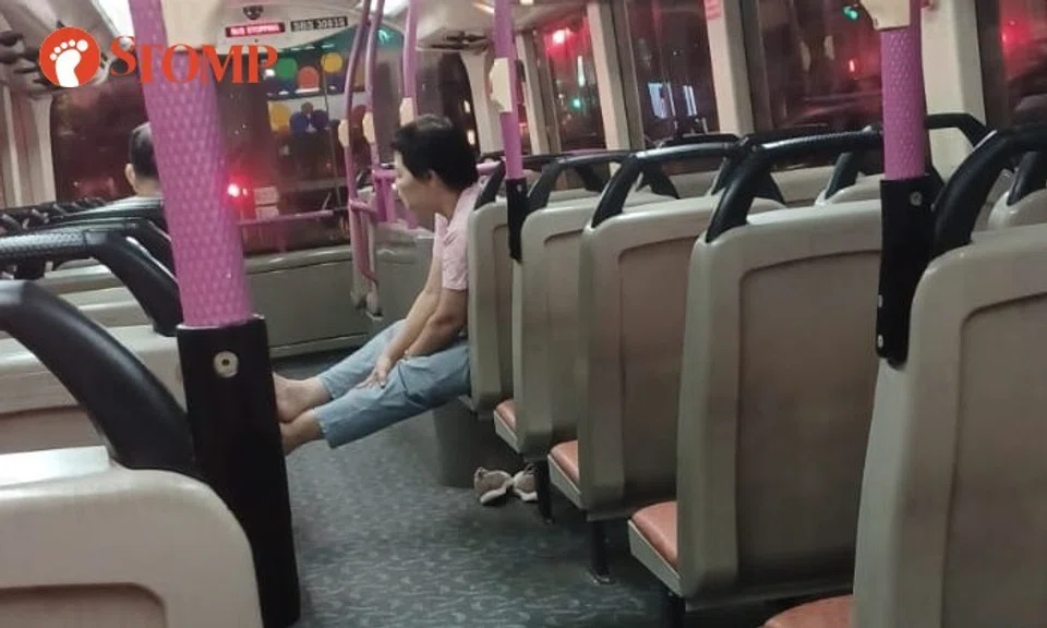 Stomper L shared a video of an aunty on bus service 166, stretching her legs across the the aisle on the mostly empty upper level of the double-decker bus.