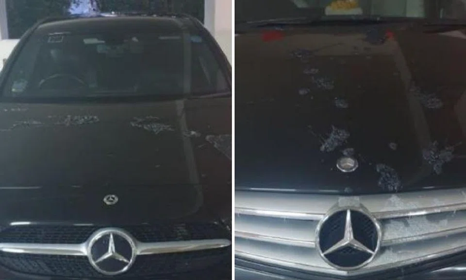 A 43-year-old man was arrested after the bonnets of two Mercedes-Benz cars were splashed with unknown substances.