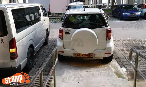 Driver takes parking goondu to new heights by blocking handicap access ramp