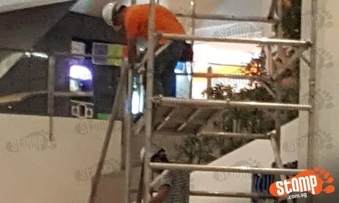 Without anti-fall arresters, these construction workers at NEX Mall risk drop from height