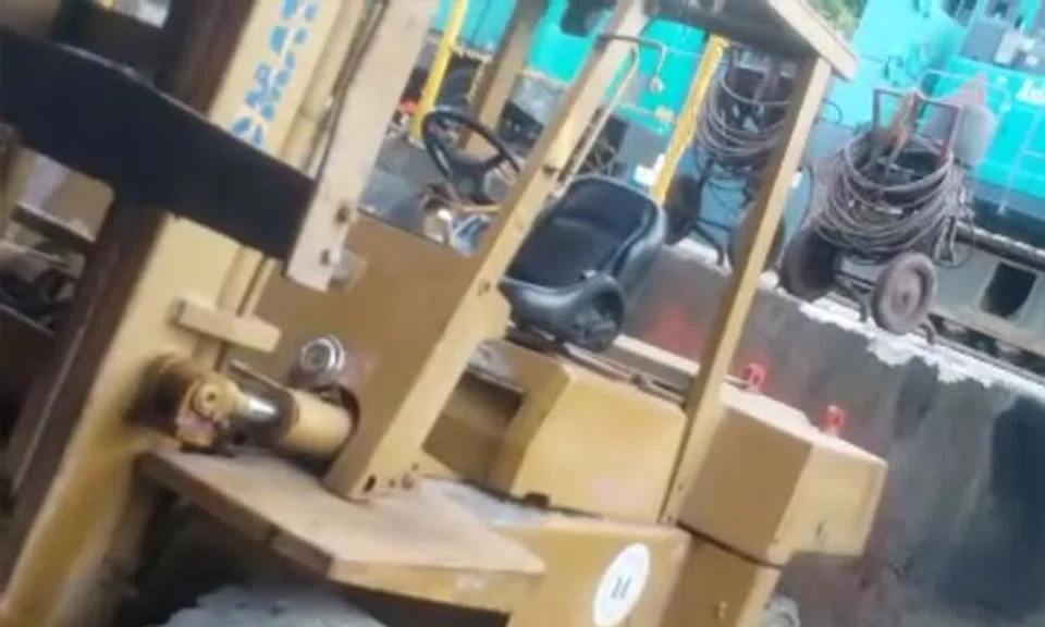 The forklift plunged into the slipway, which is a ramp used to launch a boat into the sea, and hit the 30-year-old Bangladeshi worker, who was pronounced dead by paramedics at the scene. PHOTO: ST READER