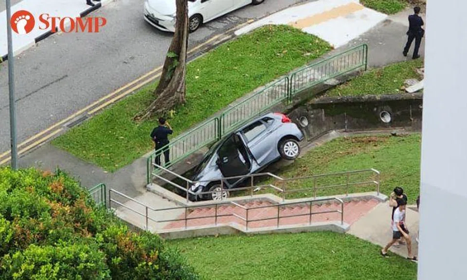 Car ends up in drain after skidding in Ang Mo Kio, 76-year-old driver taken to hospital