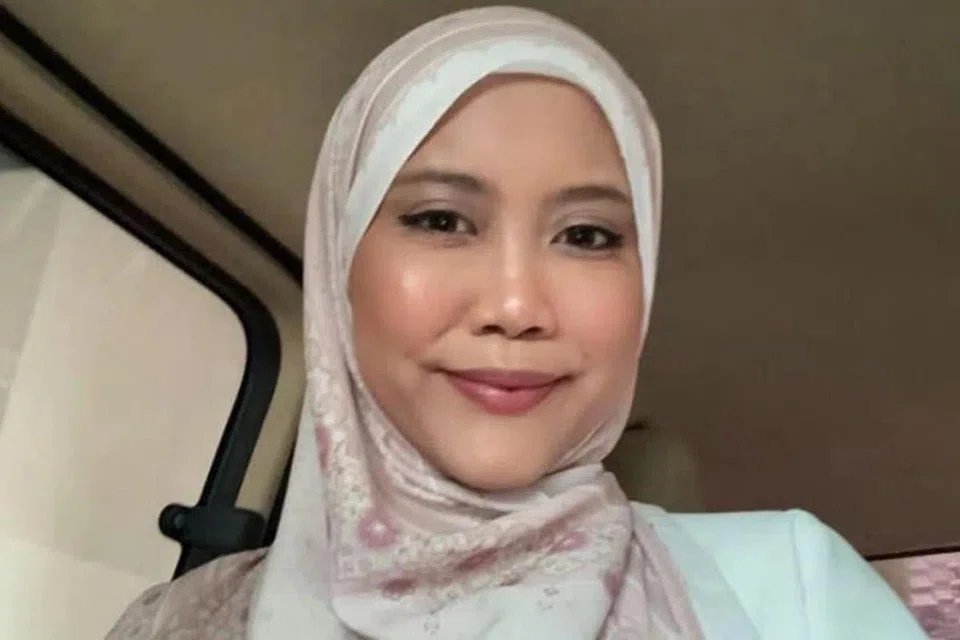 Madam Azula Cinta Idris and her husband were detained at Woodlands Checkpoint after their driver was caught smuggling contraband cigarettes.