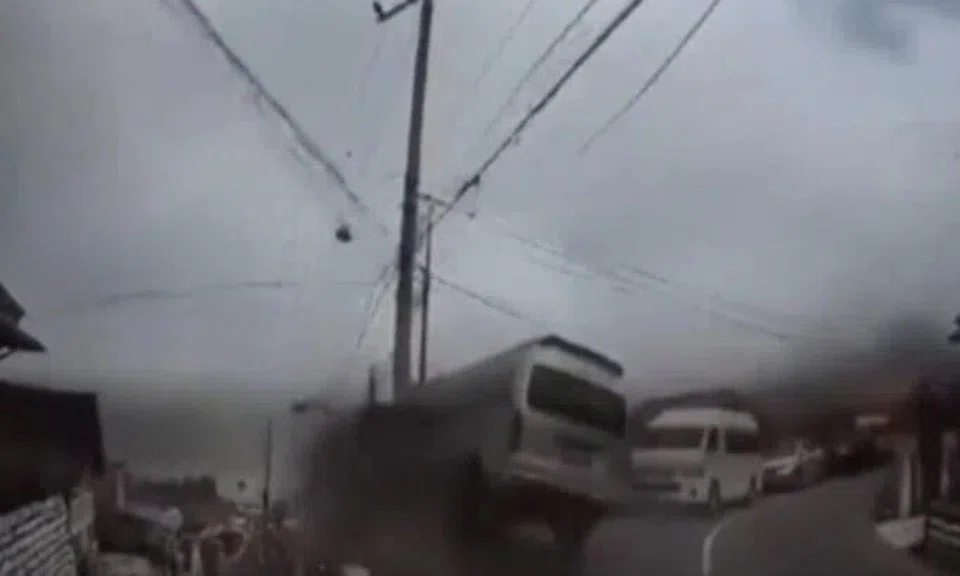 The minibus’ downhill descent is halted by an electric post that it crashes into, the video shows.