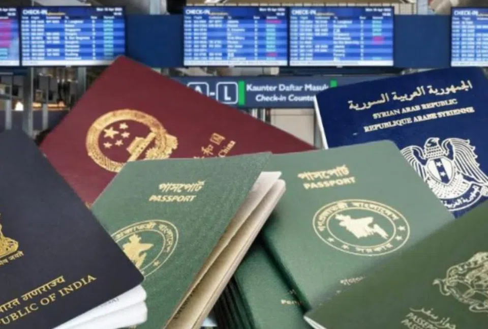 The officer was allegedly found with 12 foreign passports in his waistband.