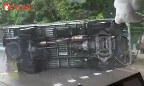 7 passengers taken to hospital, driver arrested after lorry overturns along Tuas West Road