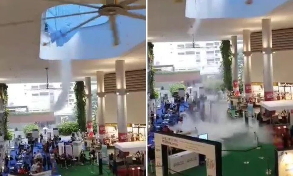 The videos show water pouring down from the ceiling onto the event floor.