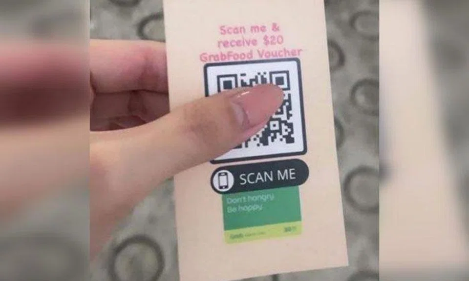 Sengkang Neighbourhood Police Centre warned of a scam involving a printed flier of a Grab food voucher giveaway and a QR code. PHOTO: SENGKANG NEIGHBOURHOOD POLICE CENTRE/FACEBOOK