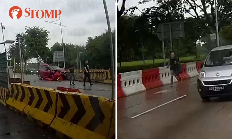 Stomper: "A red car was involved in an accident and crashed into ongoing road works. A man was spotted fleeing the scene with another man in pursuit."