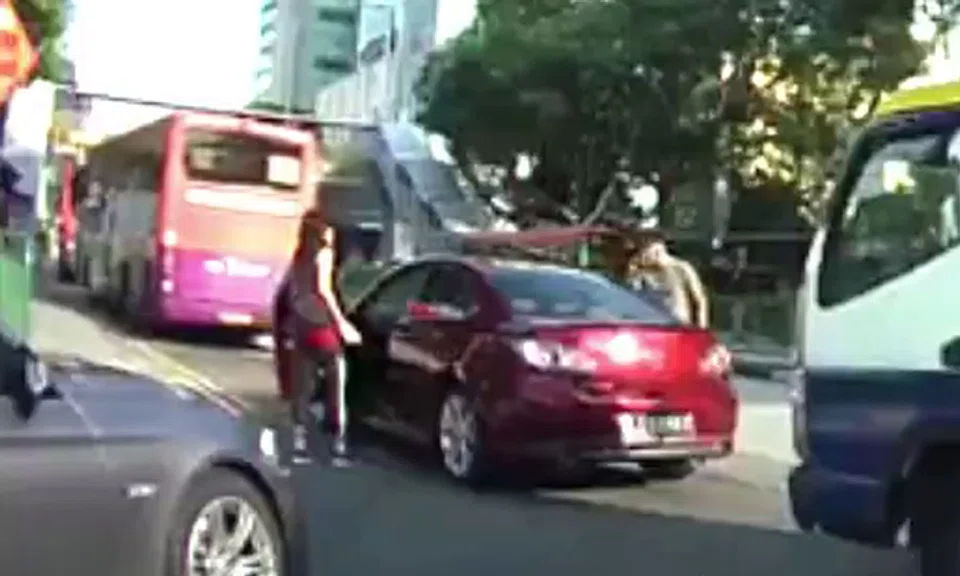 Man exits truck twice in middle of the road to confront car driver ...