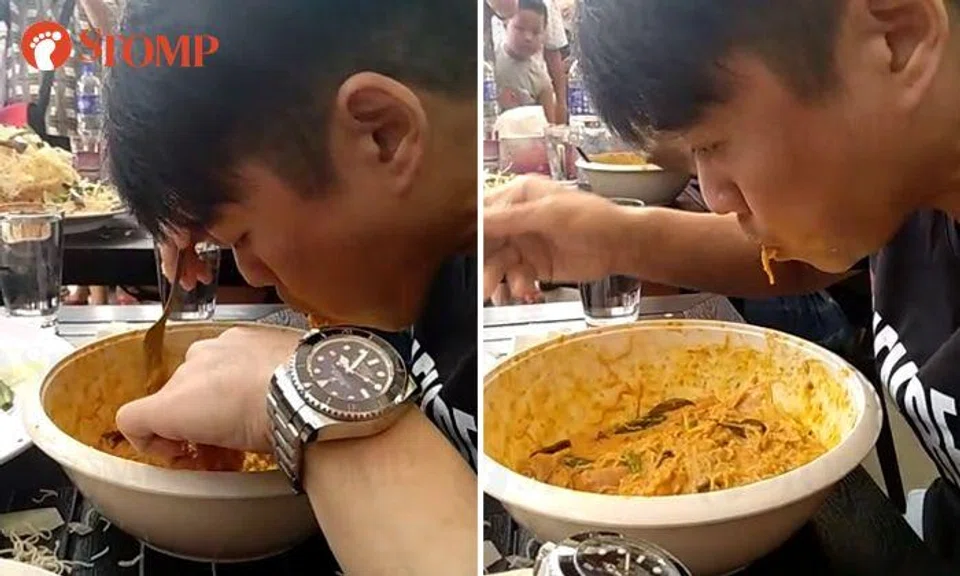 Man wins food competition, finishes 2.5kg of deep-fried beehoon and large bowl of curry in 9.5 minutes