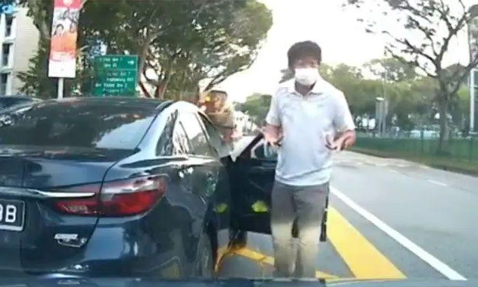 Mazda driver blocks car and gets out to confront woman who dropped son off at school