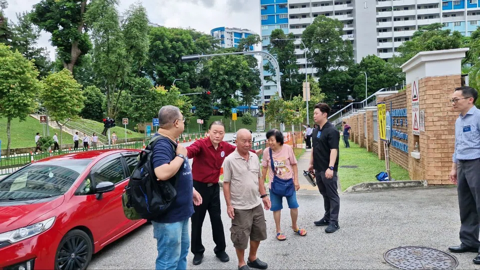 The People's Alliance for Reform's Mr Michael Fang arriving at Deyi Secondary on April 23.