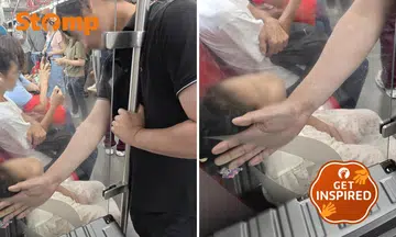 Father uses hand as daughter’s pillow on MRT