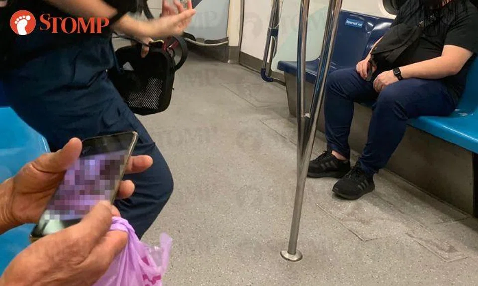 Man feels 'violated' by MRT commuter watching porn on mobile phone